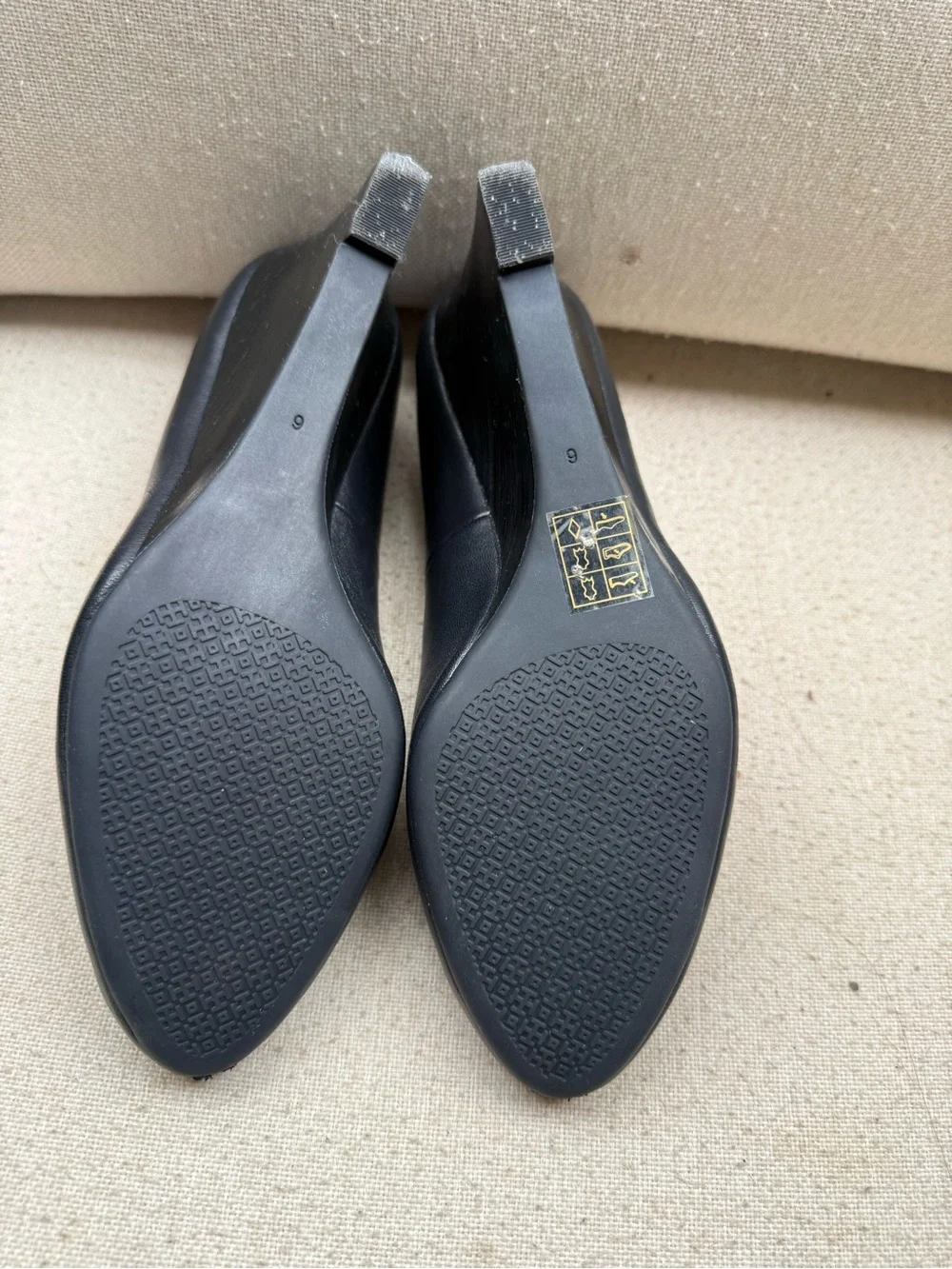 Tory Burch Black Leather Flats with Gold Logo Medallions